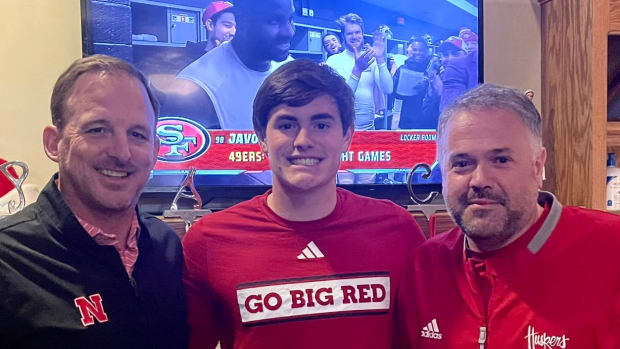Daniel Kaelin with offensive coordinator Marcus Satterfield (left) and head coach Matt Rhule in early December 2023.